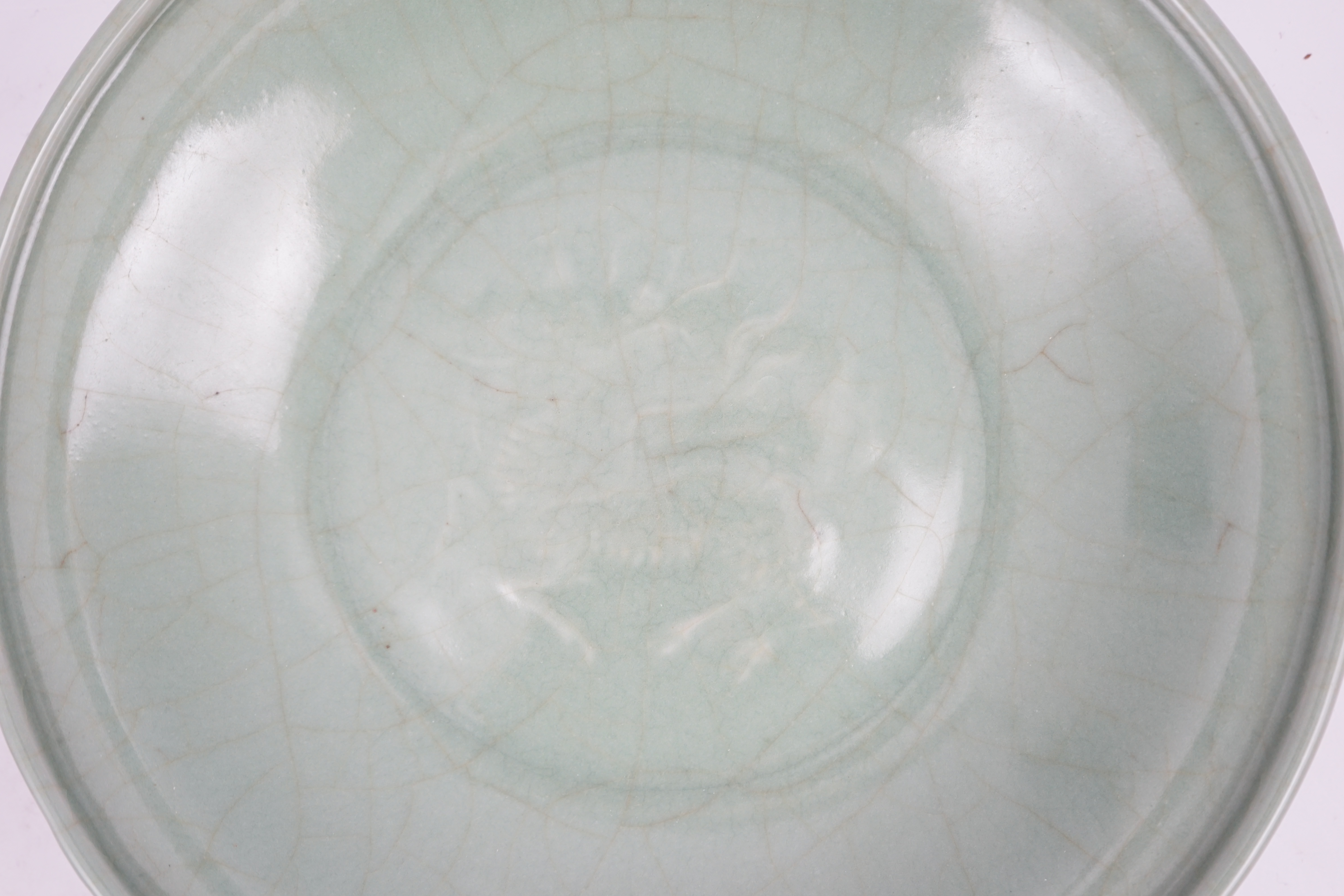 A Chinese Longquan celadon 'qilin' dish, 15th/16th century